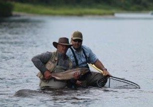 Ledges guide Dan Despres and Terry Cox with one of the many salmon Terry and his wife Trudy hooked while at Ledges.