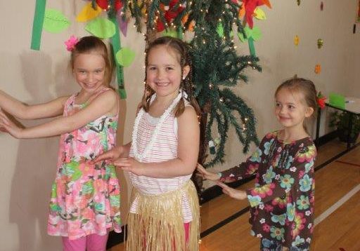 Lana Martin, Alexis Kingston and Ivory McArthur does some Hawaiian dancing