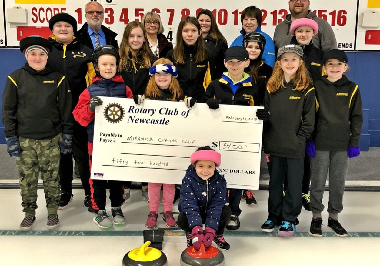 Rotary Club of Newcastle Donates To The Miramichi Curling Club