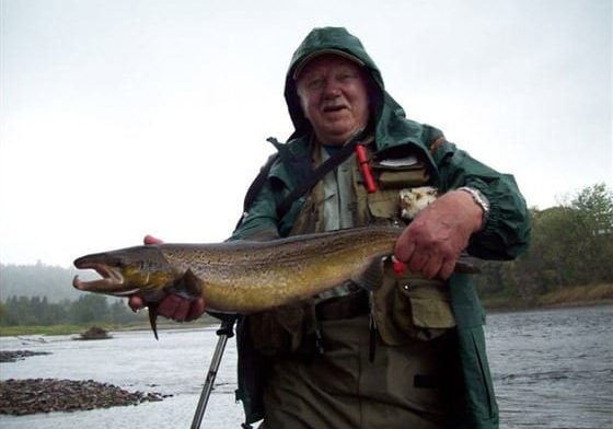 Dave Ingersoll with a male hook-bill caught at Wilson’s Sporting Camps on the Southwest Miramichi on Sunday, September 20, 2015.  He also lost another and had one pull his line.  Photo by guide Terry Stone.