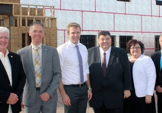 From left: Derek Burchill, chair of the Miramichi Airport Commission; Miramichi-Grand Lake MP Pat Finnigan; Premier Brian Gallant; Transportation and Infrastructure Minister Bill Fraser; Seniors and Long-Term Care Minister Lisa Harris; and Miramichi Councillor Tom King.