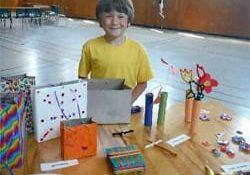 Caden at one of his craft tables during his annual fundraising craft sale.