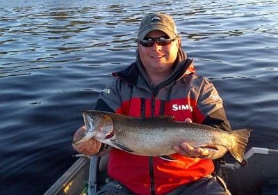 A trout landed by Derek Munn while fishing bass 23 inches long