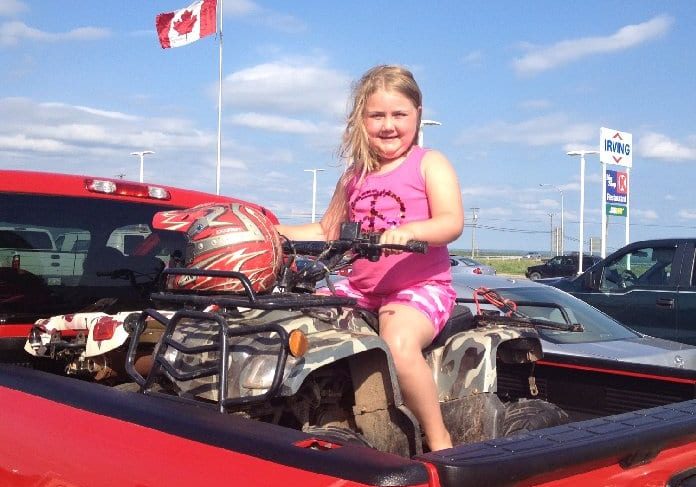 Marty Dunn with her four-wheeler.