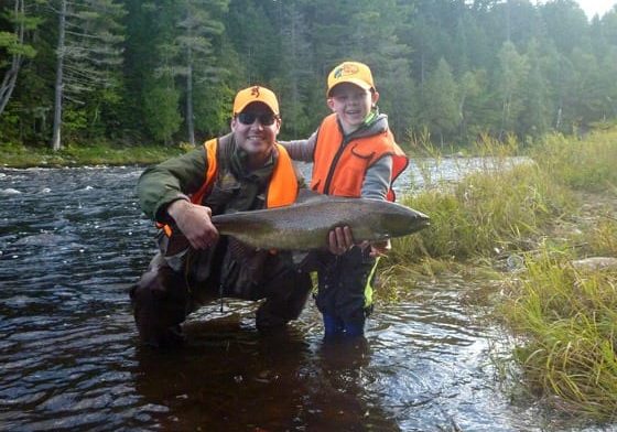 Jeff Morris and son Ben with a very nice salmon caught on the Main Southwest Miramichi