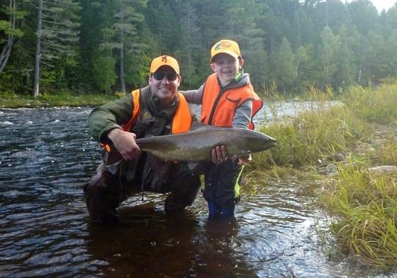 Jeff Morris and son Ben with a very nice salmon caught on the Main Southwest Miramichi