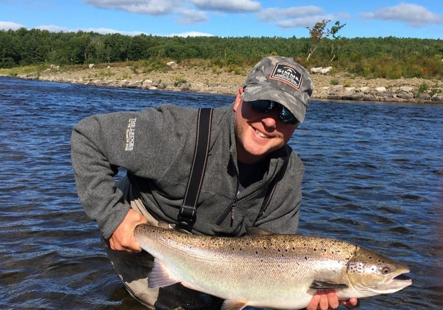 Guide Greg Amos of Ledges with a beauty hen he caught Monday morning.