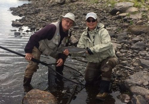 Head Guide at Mt Channel Wes Curtis and guest Trudy Cox with a fresh grilse Caught on Friday.